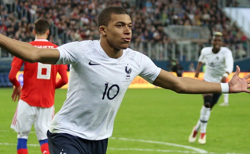 Kylian Mbappe celebrating his second goal for France on 27 March 2018.