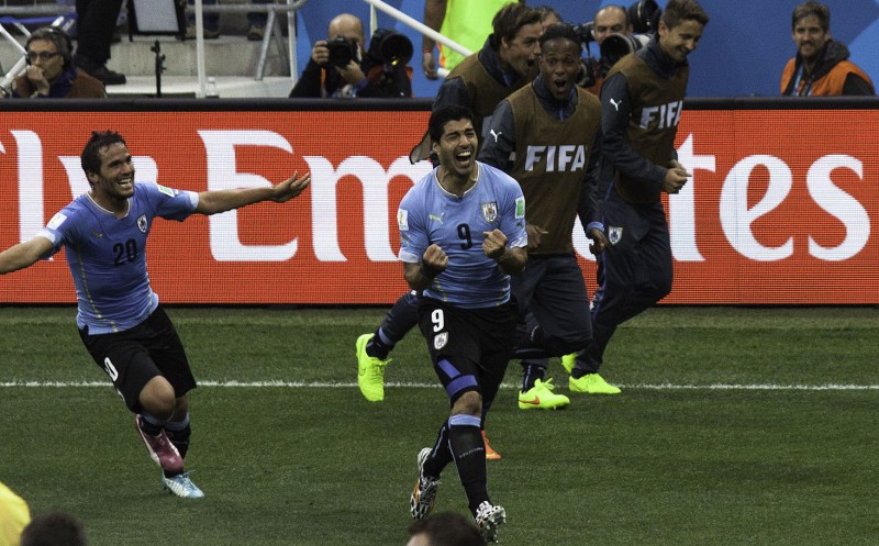 Suarez celebrates for Uruguay